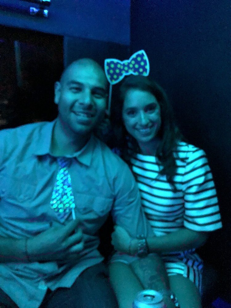 Couple on a Chicago party bus night out
