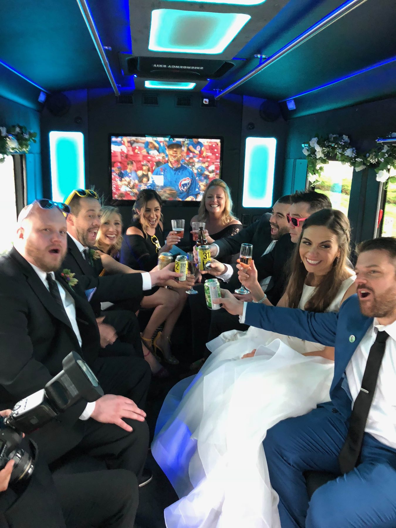 Wedding party toast on a Chicago party bus