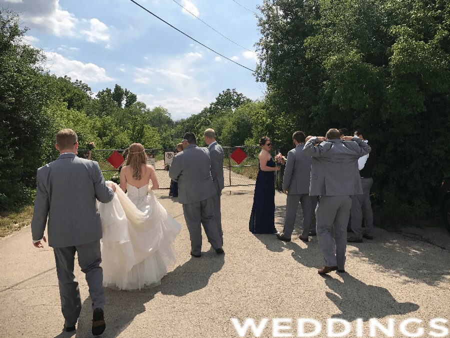 Bridal party walking to the coach on a Chicago wedding day
